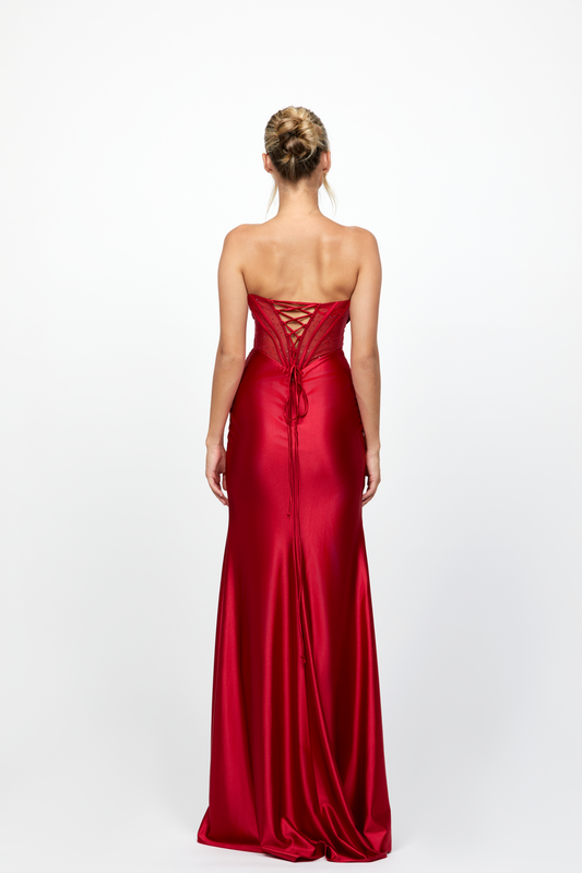 Red strapless gown on a white background